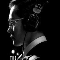 The Man Standing Next